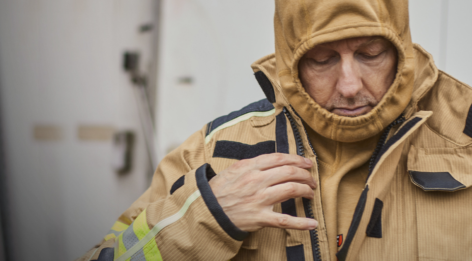Firefighter wearing maintained FlamePro Garment