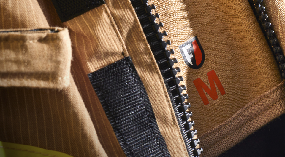 Close up of a FlamePro garment with Flamepro logo in a medium size image